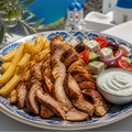 Kipgyros Schotel met patat en tzatziki – Kalispera Gyros